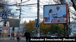 Rusiya işğal adminsitrasiyasının Xersondakı plakatlarından biri