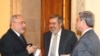 Armenian Revolutionary Federation leaders Vahan Hovannisian, left, and Hrant Markarian speak with President Serzh Sarkisian.
