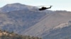 Turkey -- A Turkish military helicopter flies over a mountain in Yemisli, Hakkari province near the Iraqi border, 22Oct2011
