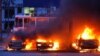 Vehiculele au luat foc în urma unui atac rusesc asupra unui cartier industrial din Zaporojie, Ucraina, 8 ianuarie 2025.