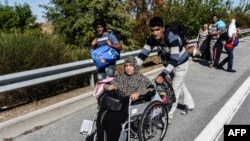 Migranți sirieni la frontiera bulgaro-turcă în septembrie 2015