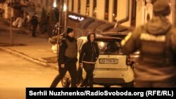 На початку року на вулицях у центрі Києва проводили слідчий експеримент у «справі Шеремета» з участю підозрюваної лікарки й волонтерки Юлії Кузьменко