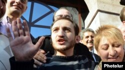 Armenia - Opposition activist Tigran Arakelian is greeted by supporters after being released from prison, Yerevan, 14Oct2013.