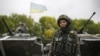 Українська військова поблизу селища Луганське, 24 вересня 2014 року