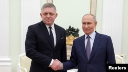 Словацький прем'єр-міністр Роберт Фіцо та президент Росії Володимир Путін під час зустрічі у Москві. Росія, 22 грудня 2024 року